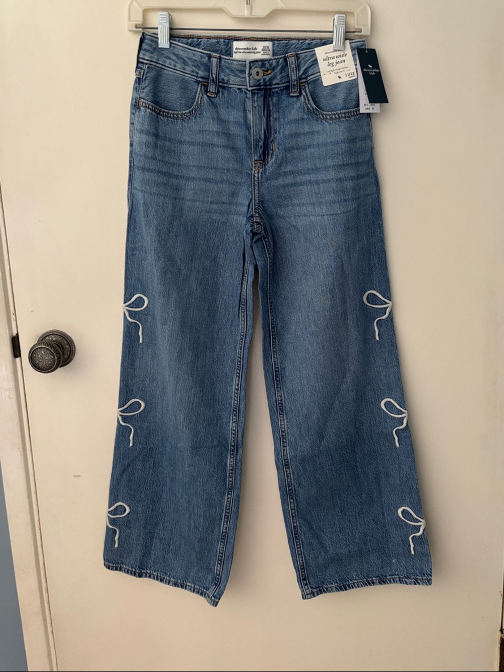 abercrombie kids denim jeans with white side bow accents